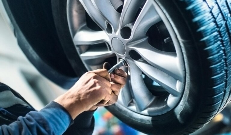 mechanic working on car